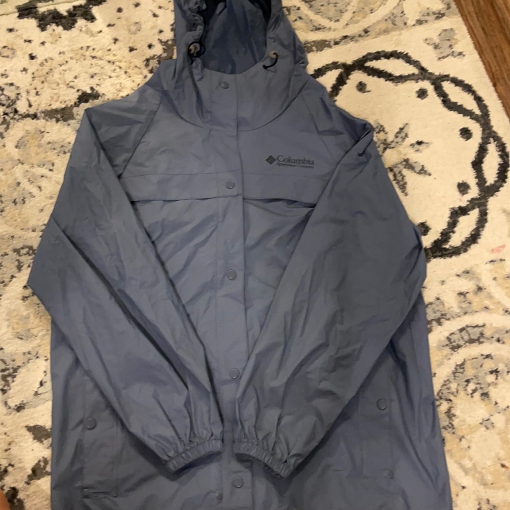 Blue rain suit set. Button and sizes. Never worn